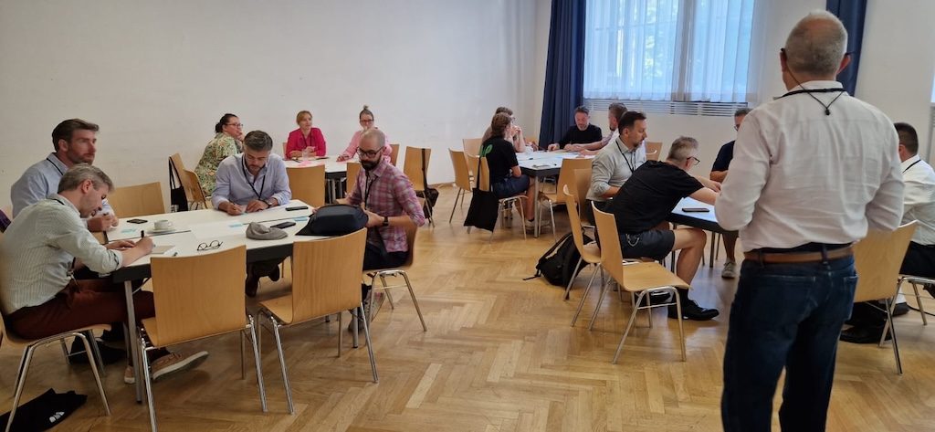 Curtis facilitating a strategic session with engaged participants